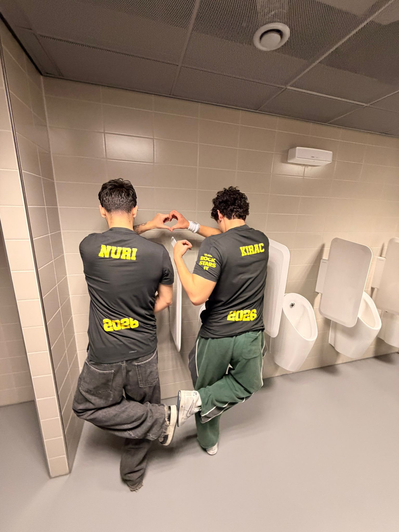 Matching team shirts reading Nuri and Kirac 2026